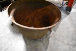 An Antique cast cauldron or smelting pot, diameter approx. 71cm