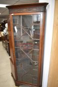 A 19th Century mahogany full height display cabinet having astral glazed foor, on bracket feet,