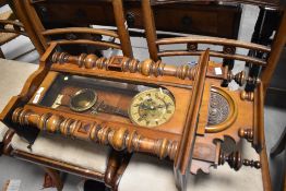 A 19th Century mahogany wall clock in the Vienna style