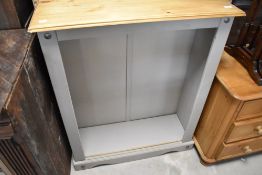 A modern part painted bookshelf, approx. width 84cm