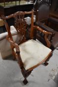 A reproduction Chippendale style carver chair