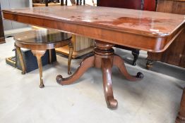 A 19th Century mahogany breakfast/dining table in the Gillows style having tilt top, with