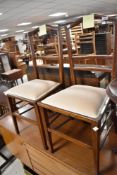 A pair of Edwardian mahogany and inlaid bedroom chairs