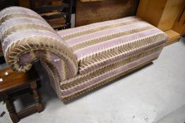 A Victorian style chaise longue, having modern lilac and cream upholstery