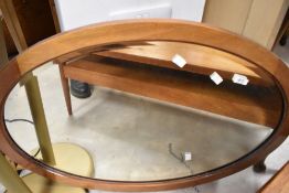 A light mahogany oval wall mirror, width approx. 81cm