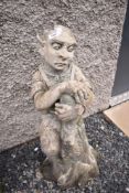 A resin and concrete garden ornament , modelled as goblin/elf, height approx. 77cm