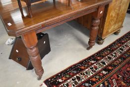 A 19th Century mahogany windout dining table (af no centre leaf)