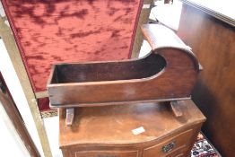 A 19th Century oak dolls or specimen cot, length approx. 45cm