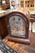 A early 20th Century bracket clock having mahogany arch case, westminster chime movement and