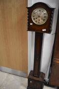 An early to mid 20th Century oak grandmother clock, height approx. 139cm