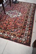 A Persian style rug, approx. 232 x 168cm