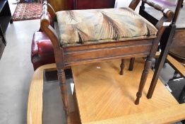 A Victorian mahogany piano stool