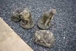 Four reconstituted garden ornaments, cat interest