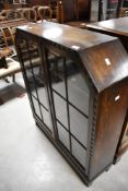 An early 20th Century oak bookcase, width approx. 92cm
