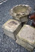 Two concrete garden pedestals and a similar urn of large form