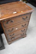 A reproduction Georgian style chest of four drawers, width approx. 46cm