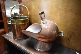 An Antique copper coal helmet and a vintage brass and copper coal bucket , companion set etc