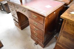 A Victorian stained frame pedestal desk, having brass Aesthetic style handles, width approx. 118cm