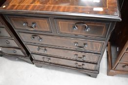 A reproduction Regency style chest of two over three drawers, width approx. 61cm