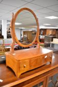 A nice quality reproduction dressing table mirror having triple drawer base, width approx. 46cm