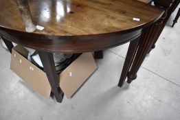 A 19th Century mahogany 'D end' style demi lune table, width approx. 132cm