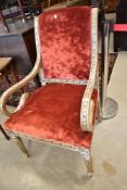 A shabby chic style scroll armchair in the classical style with russett dralon seat and back