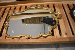 A foliate gilt frame wall mirror, height approx. 94cm