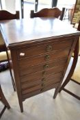 An early 20th Century mahogany seven drawer music cabinet, height approx. 96cm
