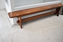 A traditional mahogany school/form bench, length approx. 216cm