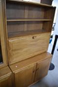 An Ercol Windsor bureau bookshelf, height approx. 183cm, width 91cm