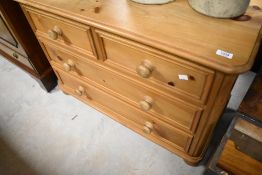 A natural pine bedroom chest of two over two drawers, width approx. 92cm