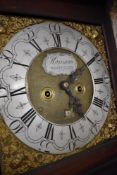 An 18th Century mahogany long cased clock having 8 day movement , with brass and silvered dial named