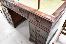 A reproduction Regency pedestal desk