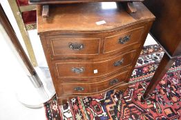 A reproduction dwarf chest of two over two drawers