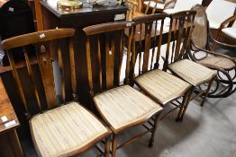A set of four early to mid 20th Century Edwardian style salon chairs
