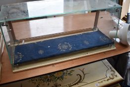 A vintage glass shop counter display, not branded, width approx. 75cm