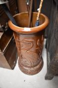 A 19th Century Bretby style salt glazed stoneware stick stand having Stork and Reed decoration,