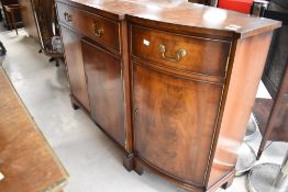 A reproduction Regency break front sideboard of slim proportions, width approx. 168cm