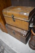 Two vintage tin travel trunks
