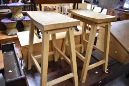 A pair of modern beechwood stools, width approx. 40cm, height 60cm