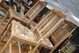 A set of four early 20th Century oak dining chairs