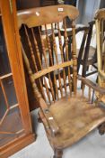A 19th Century low seat spindle back armchair