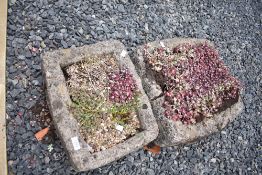 Two concrete garden troughs (as found, one cracked through) contents included