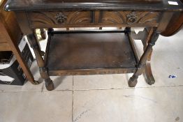 A priory style dark stained side table