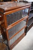A late 19th or early 20th Century Globe Wernicke three tier stacking bookcase on drawer base,
