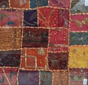 An attractive late 19th century patchwork coverlet fragment, constructed with blocks of material