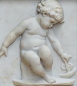 A Rococo style parian ware plaque of a putti playing with a boat, mounted in a deep gilt frame, with