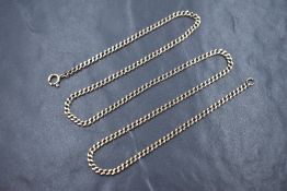 A 9ct gold curb link chain, marked 375, 56.5cm, 13.7g
