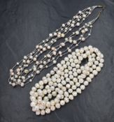 A long string of baroque pearls, approximately 56' and a five strand necklace of silver thread and