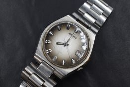 A Seiko Automatic wristwatch, the ombre grey dial having baton numerals and date aperture, on a